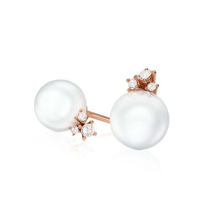 Pair of earrings in 18-carat 750 thousandths pink gold with hand-crafted pearl on a pink gold mount set with 3 diamonds